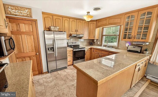 Building Photo - 7203 Peekskill Dr