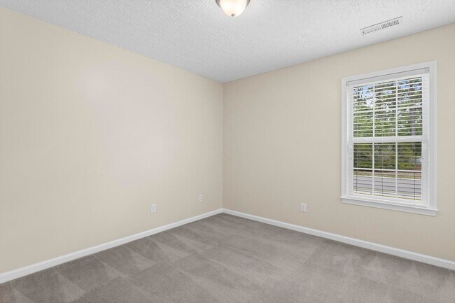 Building Photo - House with Fenced Back Yard Available!