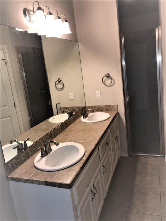 Building Photo - Meander Estates! Large corner lot 3/2/2 Coming August 2025. Covered patio!
