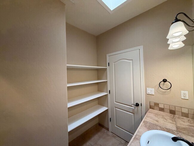 Building Photo - 4 Bedroom Single Story Custom Home Available In Rio Rancho Near Unser Blvd SE & Westside Blvd SE!