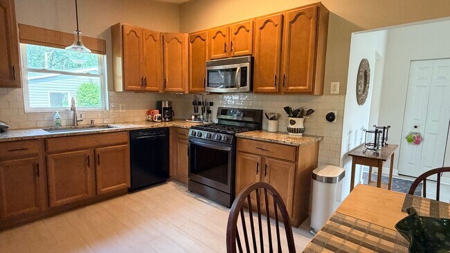 Building Photo - Riverfront Living on the Fox: 2 Bed, 1 Bath with Private Dock and Oversized Garage