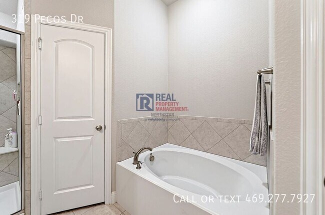 Building Photo - 319 Pecos Dr
