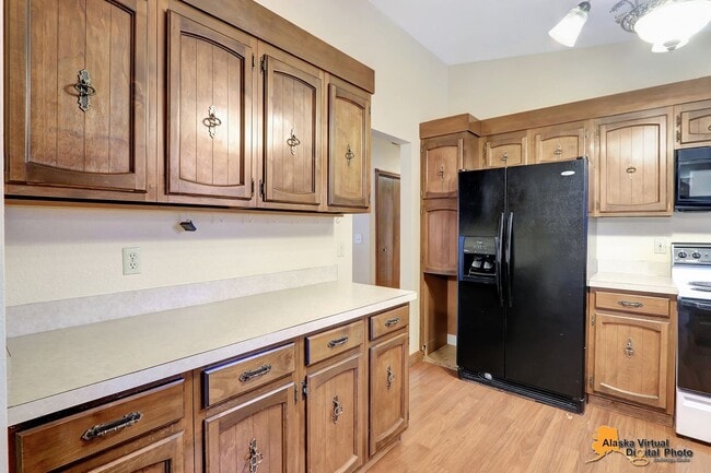 Building Photo - Spacious Home with Garage & Fenced Yard Near JBER & Major Hospitals