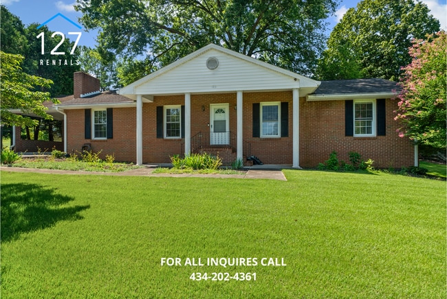 Primary Photo - Spacious 4-Bedroom Home with Dual Kitchens...