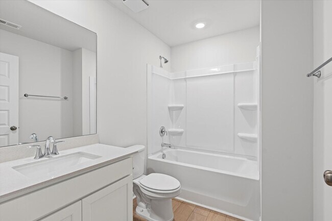 Building Photo - New 4BR Home in Whispering Woods – Spaciou...