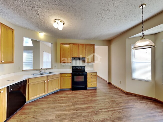 Building Photo - 8845 Amaranth Ct