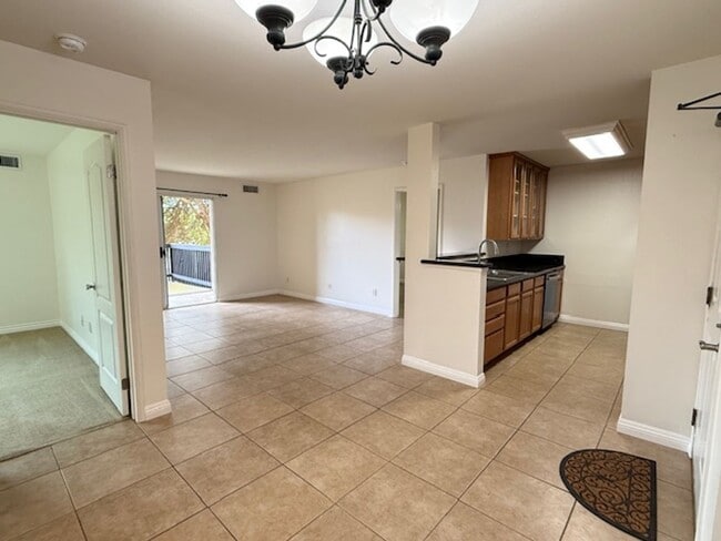 Building Photo - Resort-Style 2BR/2BA First-Floor Condo in Gated Lucera Community Near UTC