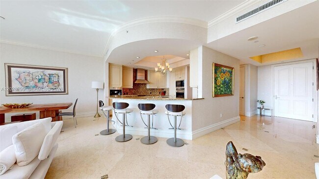 Building Photo - 10295 Collins Ave