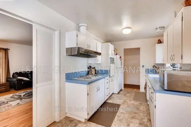 Building Photo - 13980 SW Domino St