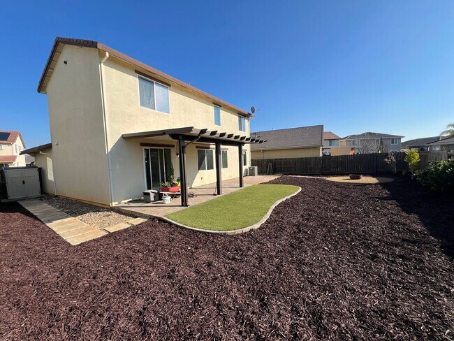 Building Photo - Beautiful 4 Bedroom Solar Home With Low Maintenance Landscaping And Updated Interior