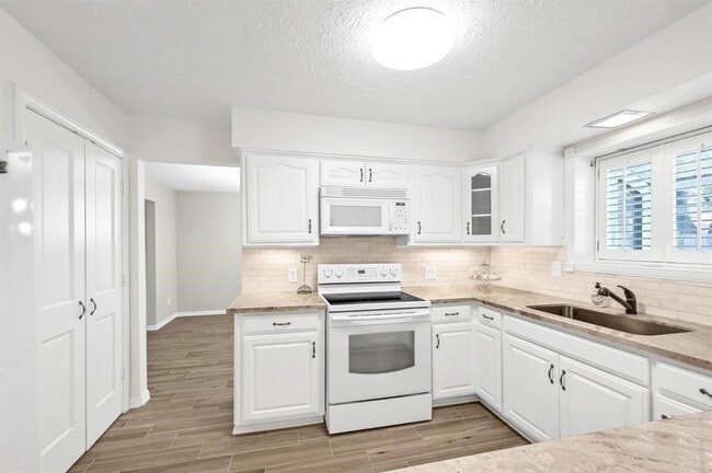 Building Photo - 8306 Wind Forest Dr