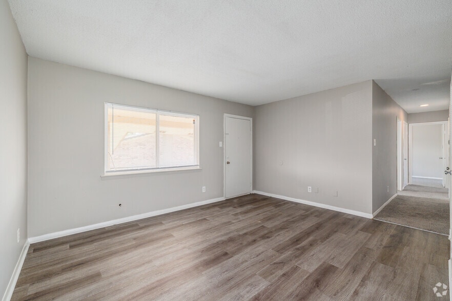 3BR, 2BA - 1,040SF - Living Room - West Scenic Apartments