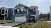 Building Photo - Enjoy the amenities in this  4 bedroom, 2....