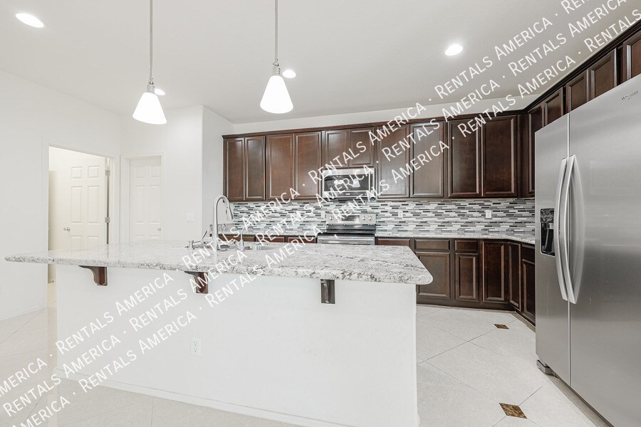 Building Photo - 10915 E Calypso Ave