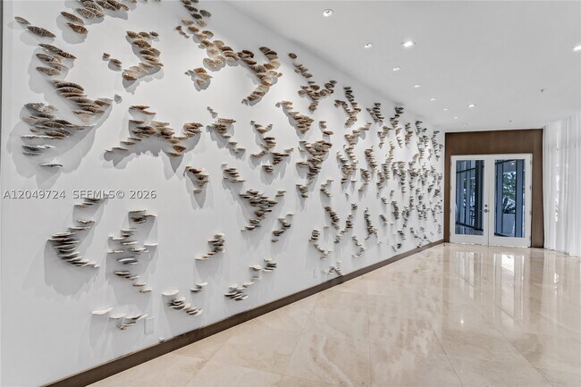Building Photo - 10275 Collins Ave