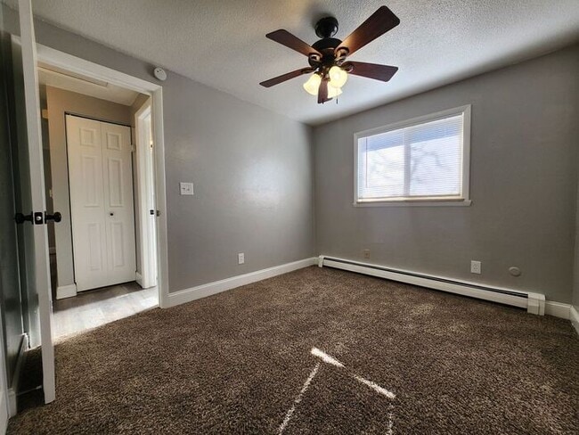 Building Photo - Cozy 2-Bed, 1-Bath Apartment – Upper Level with Covered Outdoor Space!