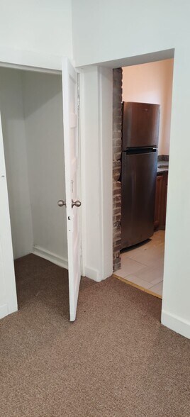 LR closet next to kitchen - 2321 Eutaw Pl