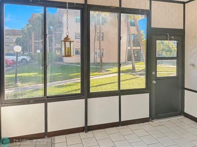 Building Photo - 6090 N Sabal Palm Blvd