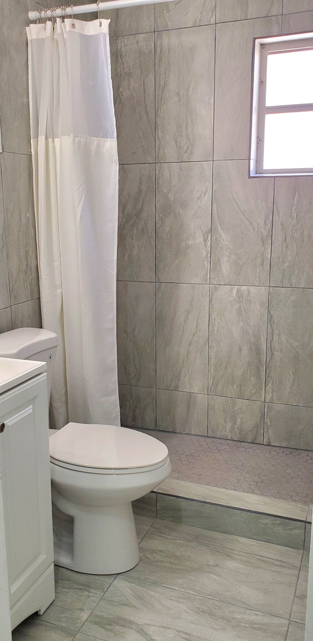 Remodelled Tile Bath - 703 124th Street Gulf