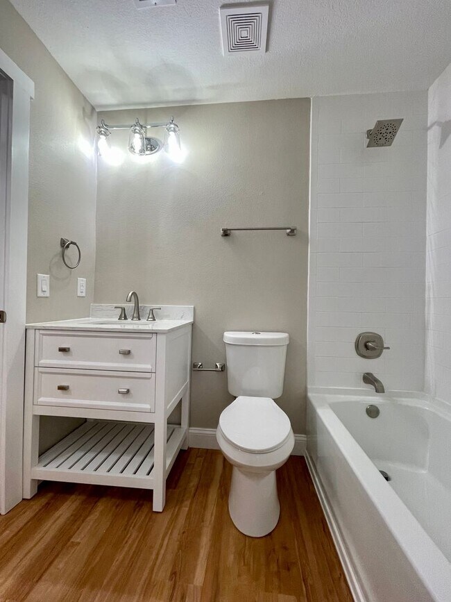 Building Photo - Fully Renovated 2B/2B condo located behind...