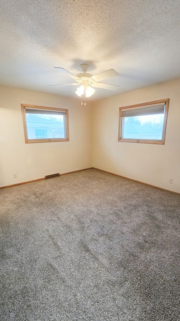 Building Photo - Charming & Updated 3-Bedroom Home with Sunroom, Fireplace & Garage