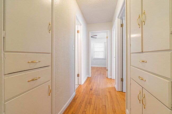 Building Photo - Three Bedroom Home in tree filled neighborhood! Lawn care included!