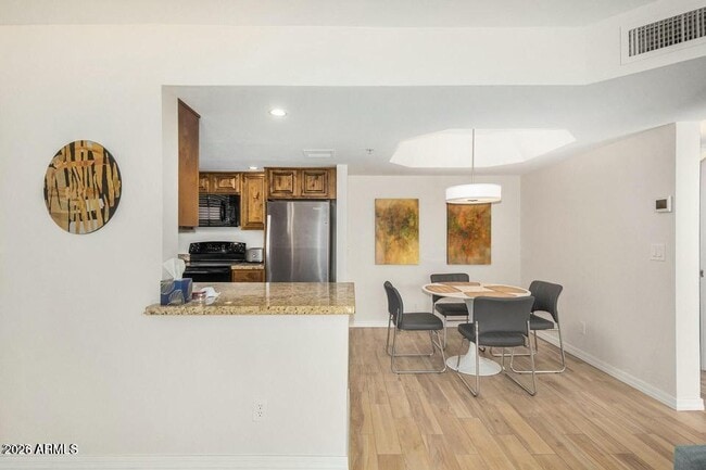 Building Photo - 4850 E Desert Cove Ave