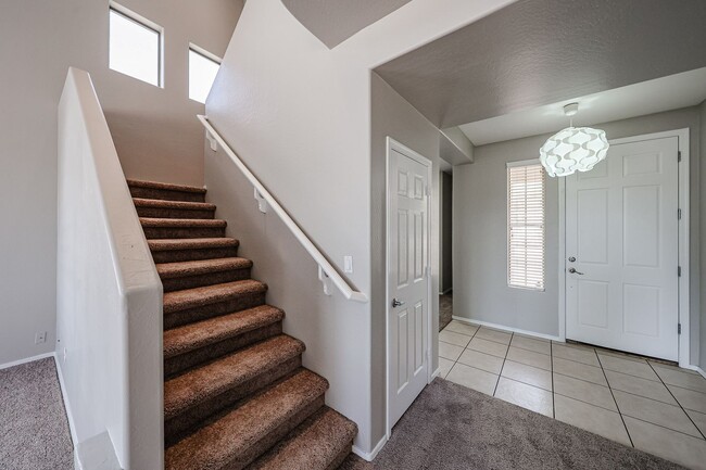 Building Photo - Welcome to this spacious 4 bedroom, 2.5 ba...