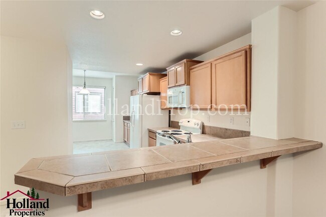 Building Photo - Modern 2-Bedroom Townhome with Garage & Private Deck