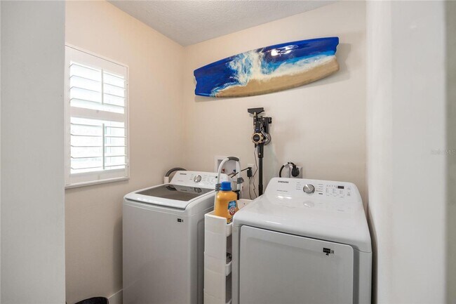 Building Photo - Coastal Luxury with Water Views – Fully Furnished, Utilities Included & Ready for Move-In!