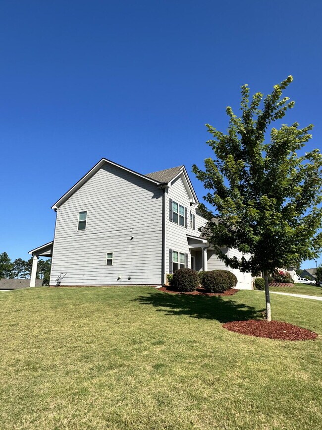 Building Photo - Beautiful 4BR Home in Mundy Mill | Corner Lot | Resort-Style Amenities