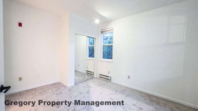 Building Photo - Sunlit & Spacious Ground-Level Condo | 12-Foot Ceilings, Luxury Amenities & Ideal Locale