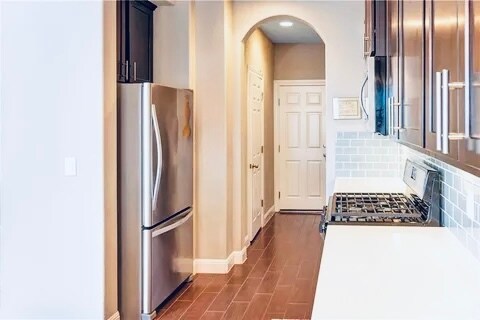 Kitchen - view to 1/2 bath and garage - 2304 S Lakeline Blvd