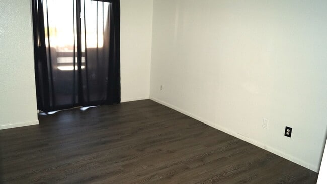 Building Photo - End Unit with Strip Views