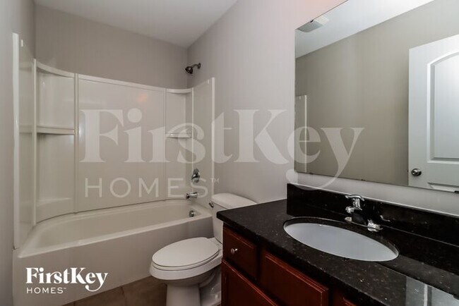 Building Photo - 5695 Saint Adriens Way