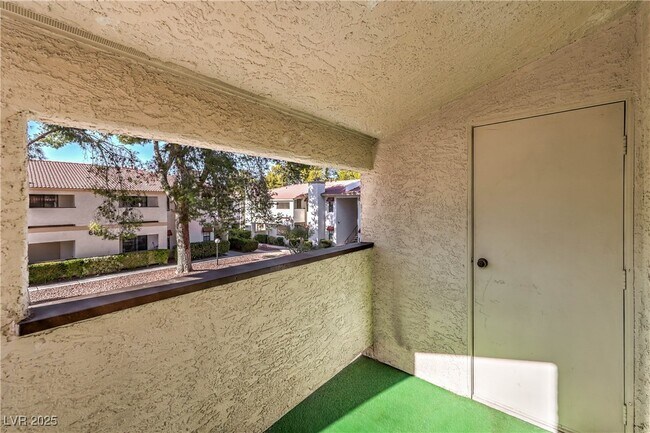 Building Photo - 6647 W Tropicana Ave