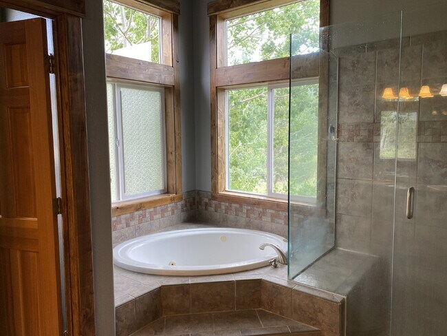 Building Photo - "Spacious 4-Bedroom Retreat with 3 Full Ba...