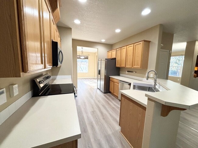 Building Photo - Stunning Remodeled Home with Office, A/C, Fenced Yard & Flexible Living Space!