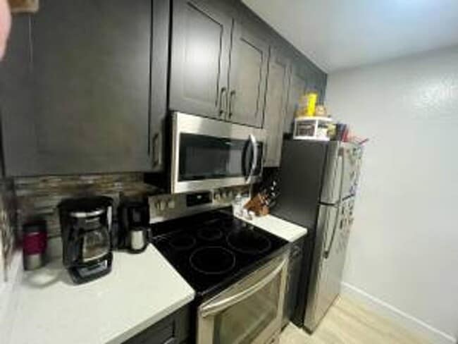 Building Photo - 6 MONTHS SHORT TERM RENTAL FURNISHED CONDO AVAILABLE
