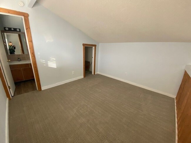 Building Photo - Year Lease 3 bedroom unit with Carport and...