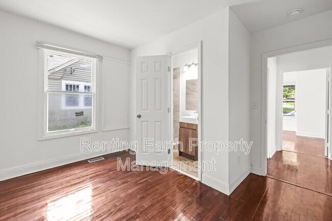 Building Photo - 8215 Rugby Ave