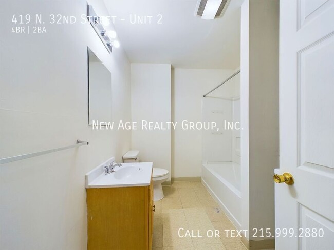 Building Photo - Spacious, Bi-level Apartment Available at ...