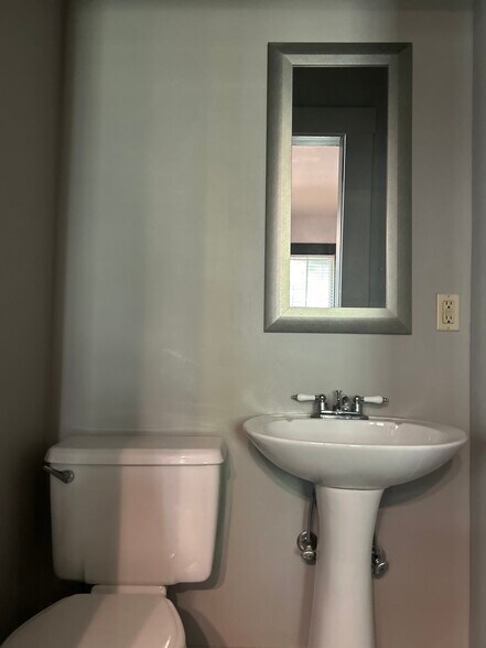 1/2 bath off the kitchen - 118 E Kossuth St