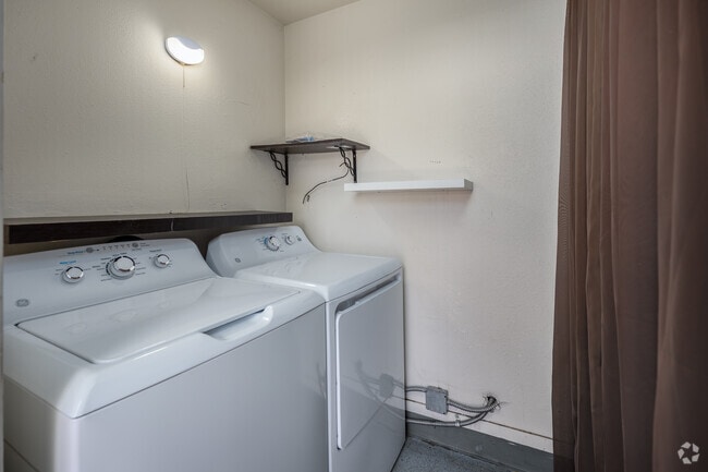 2BR, 1BA - 875SF - Laundry Room - Peacock Apartments