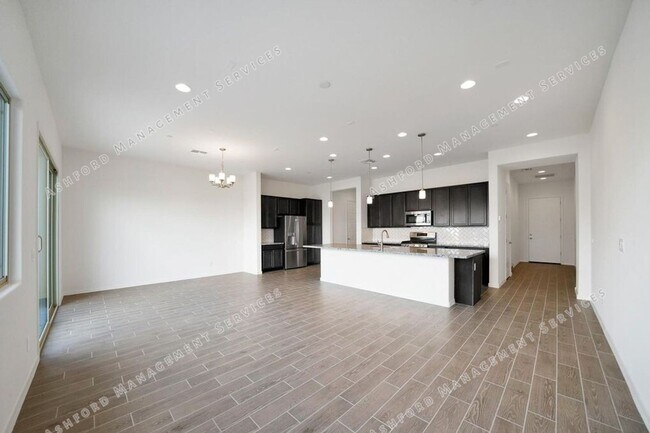 Building Photo - Luxury 3-Bedroom Townhome with Rooftop Dec...