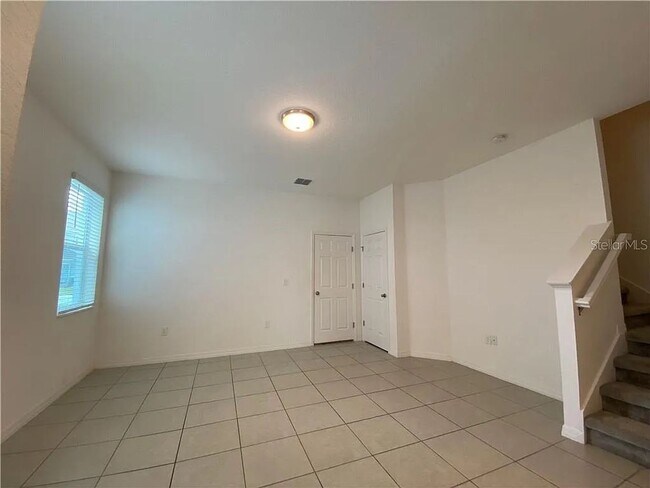 Building Photo - Beautiful End Unit Townhome Near Lake Nona w/ 2-Car Garage & Conservation Views!