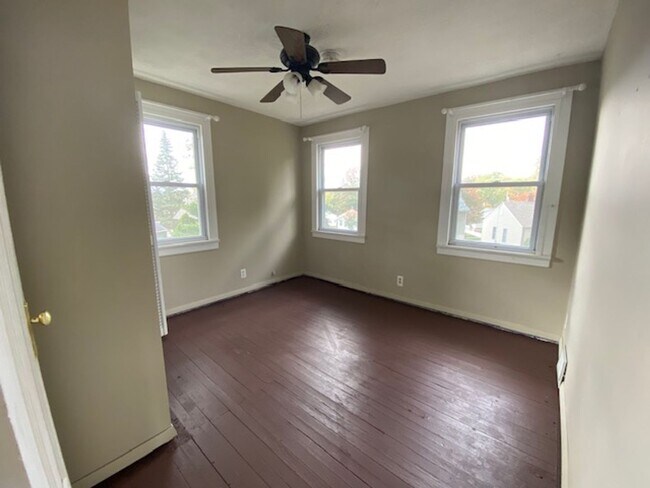 Building Photo - Fenced Yard + Porch in Goodyear Heights—3BR Charmer