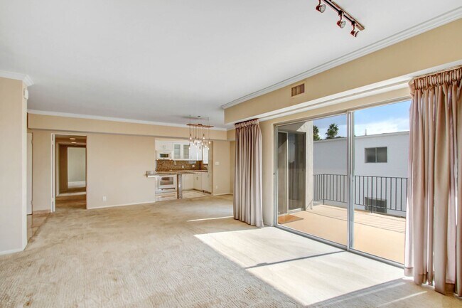 Building Photo - Spacious & Bright 3BR Condo with Bonus Room, Secured Parking & Hollywood History!
