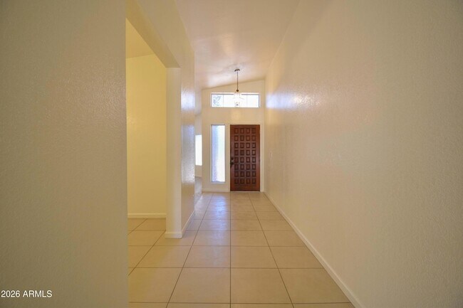 Building Photo - 5570 W Becker Ln
