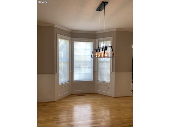 Building Photo - 9587 NW Caxton Ln